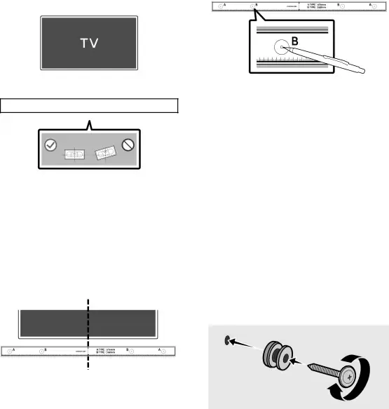 1.Coloque la Guía para montaje en la pared sobre la superficie de la pared.